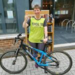 fundraiser with bike and books
