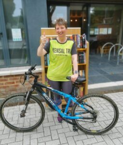 fundraiser with bike and books